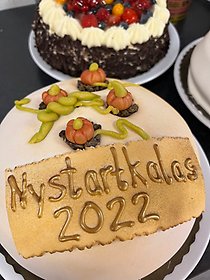 Tårta med text Nystartkalas 2022